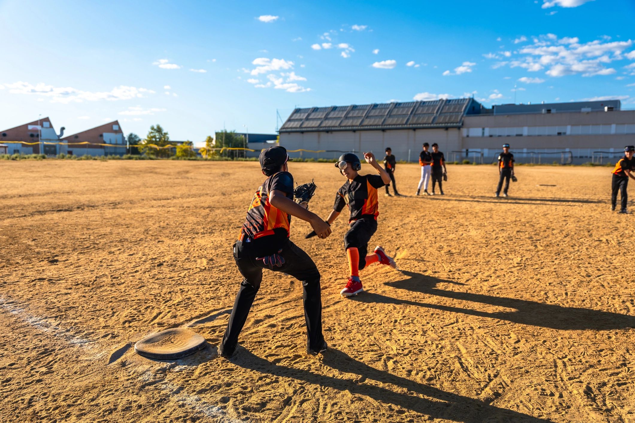 Youth athletes in motion during a competitive field play